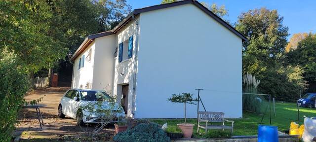 Isolation par l'exterieur d'une maison des années 1970 à Saint Laurent De Mur dans le Rhone